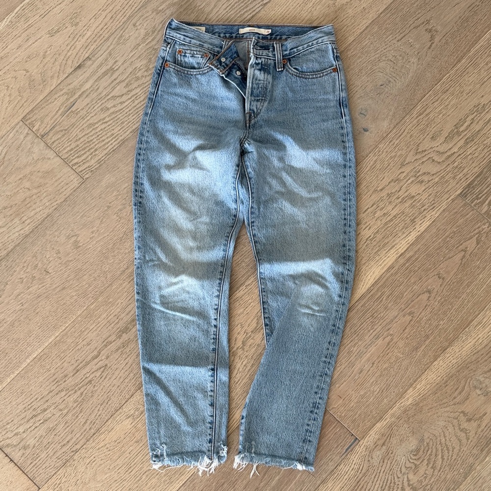 Levi's High-Rise Light Blue Denim Jeans with Frayed Hem
